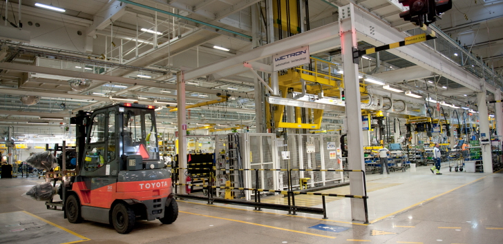 A truck driving on the  track in the manufacturing premises