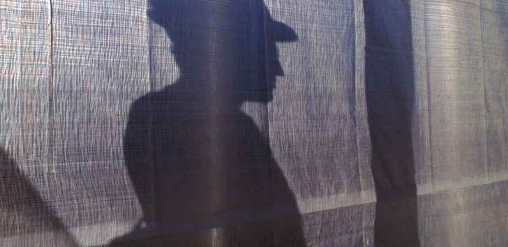 Shadow of person with helmet